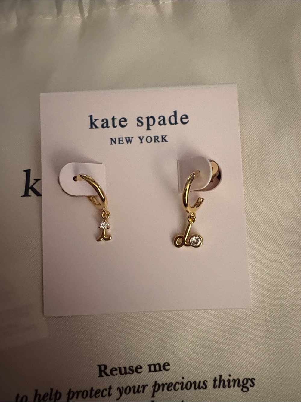 Kate Spade “Say Yes” Gold Earrings with Cubic Zirconia stones
